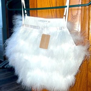 Vestique Boutique, never worn, white feather tank. Size small, adjustable straps